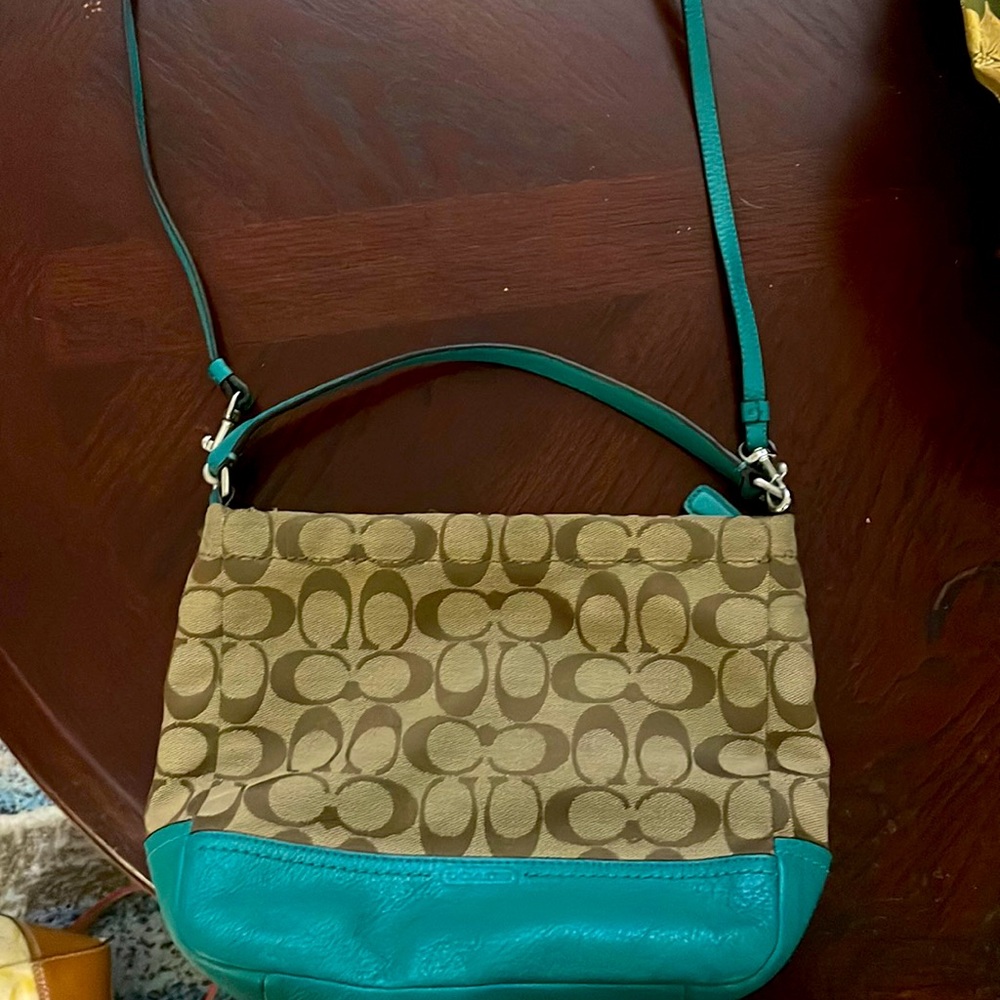 Coach handbag…. Teal with shoulder strap and handle. Gently used